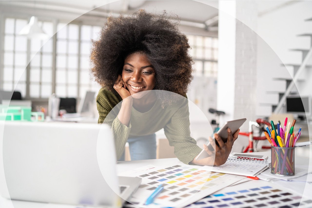 business owner looking at laptop